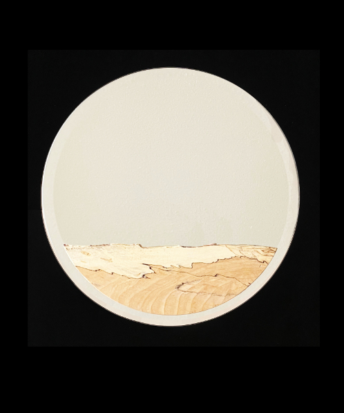 A mirror overlaid with spalted maple